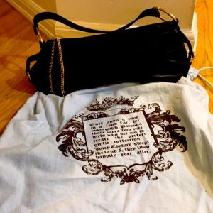 Black leather clutch with gold accents